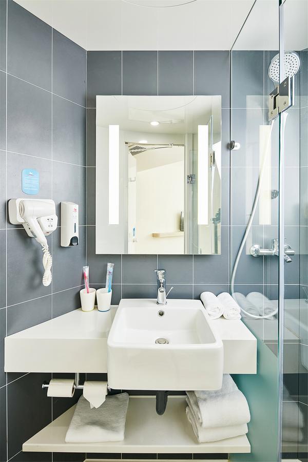 Hanting Hotel Qingdao Zhanqiao Railway Station Екстер'єр фото